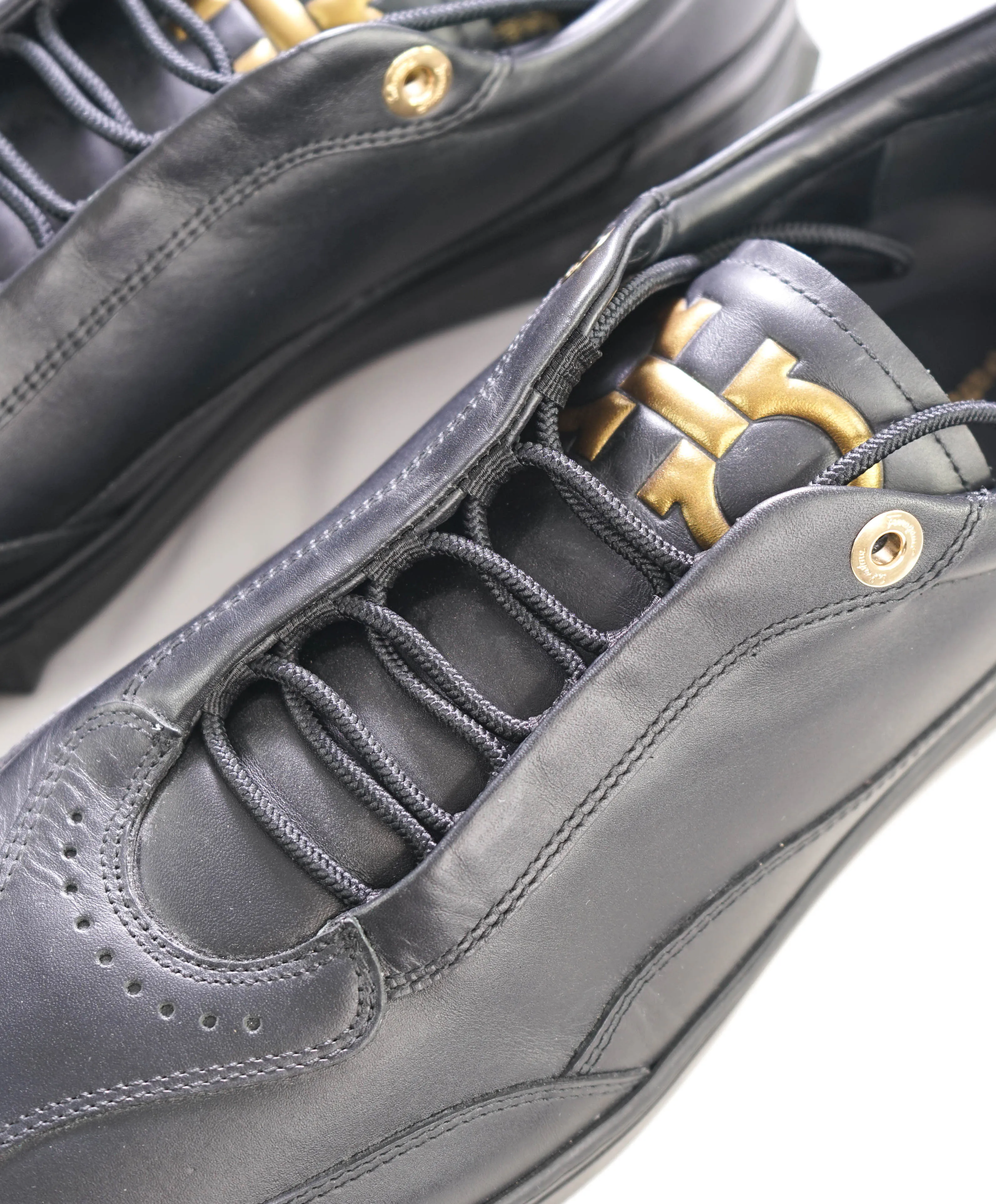$750 SALVATORE FERRAGAMO - Black Gold Gancini Sneaker - 10 US